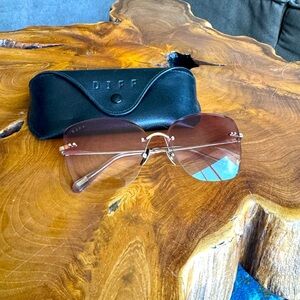 Diff sunglasses frameless with mauve tint